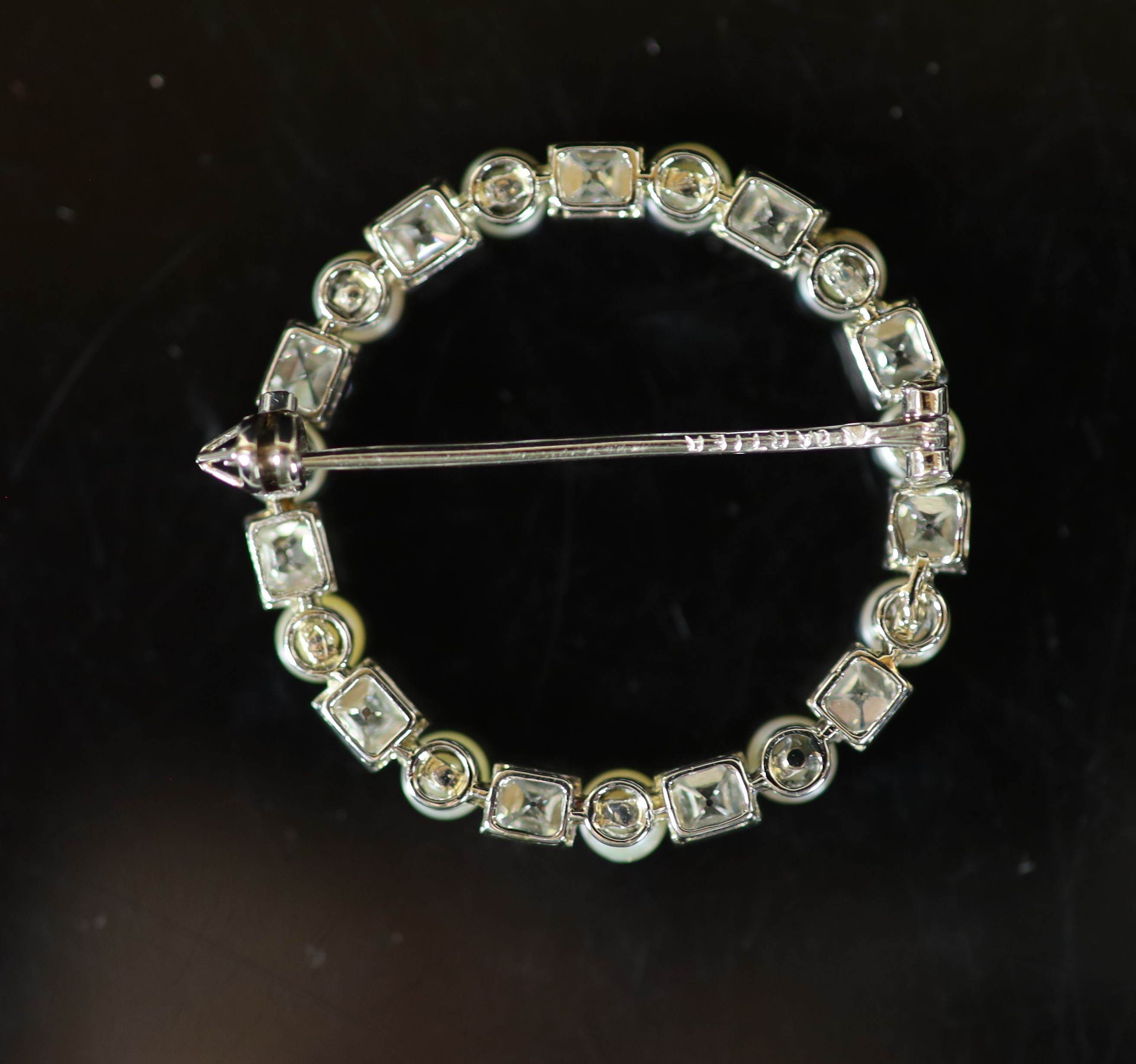 A mid 20th century French Cartier 18ct gold, pearl and diamond set open work circular brooch